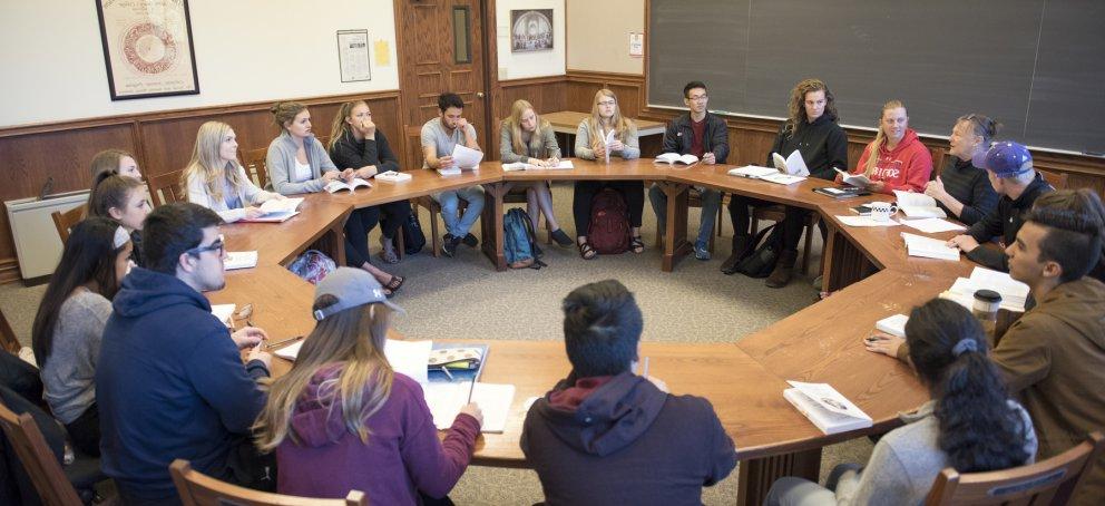 roundtable classroom image with seated students